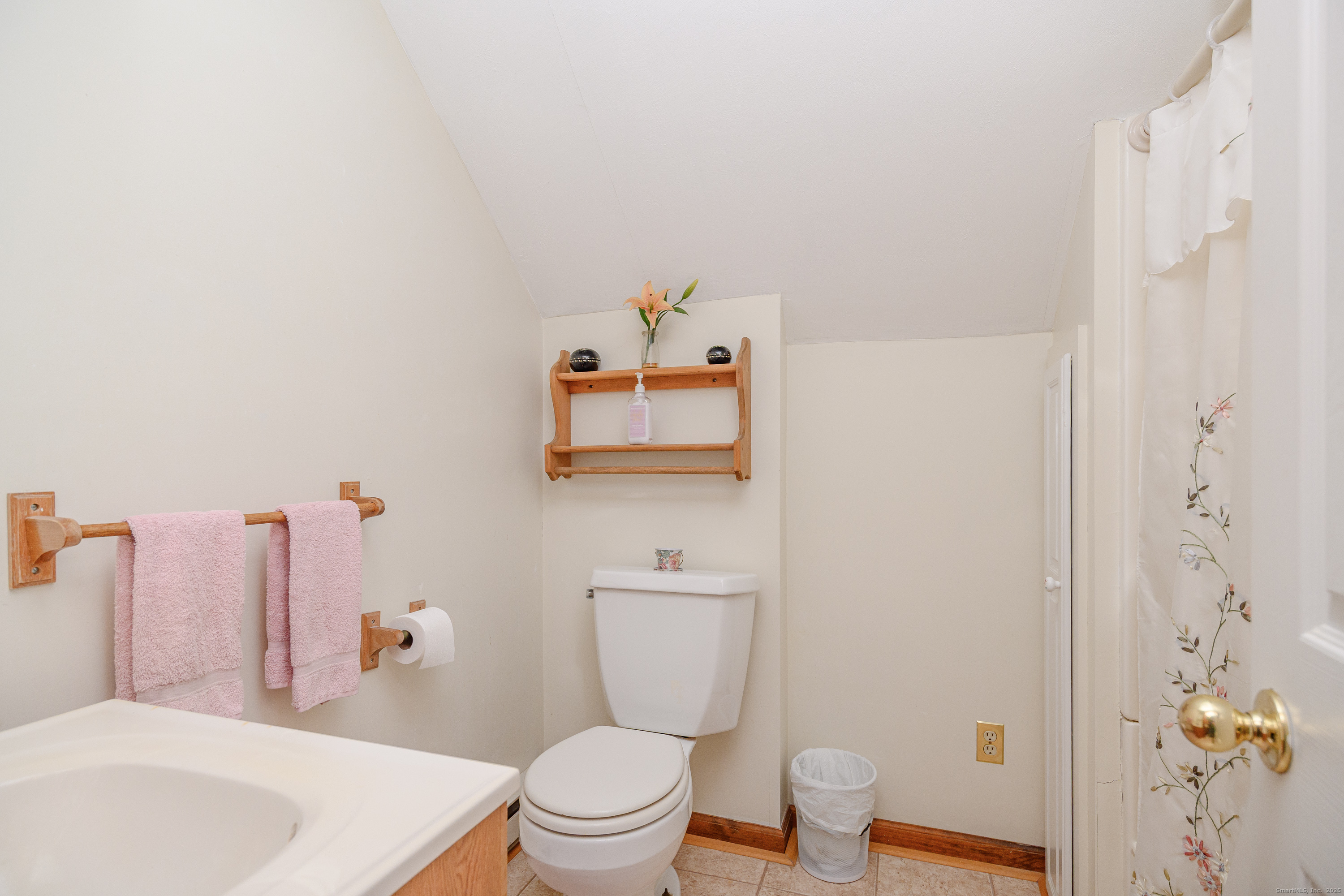 14 Concord Ridge Road Newtown, CT 06482 - Photo 28 of 40 a white toilet sitting next to a bathroom sink