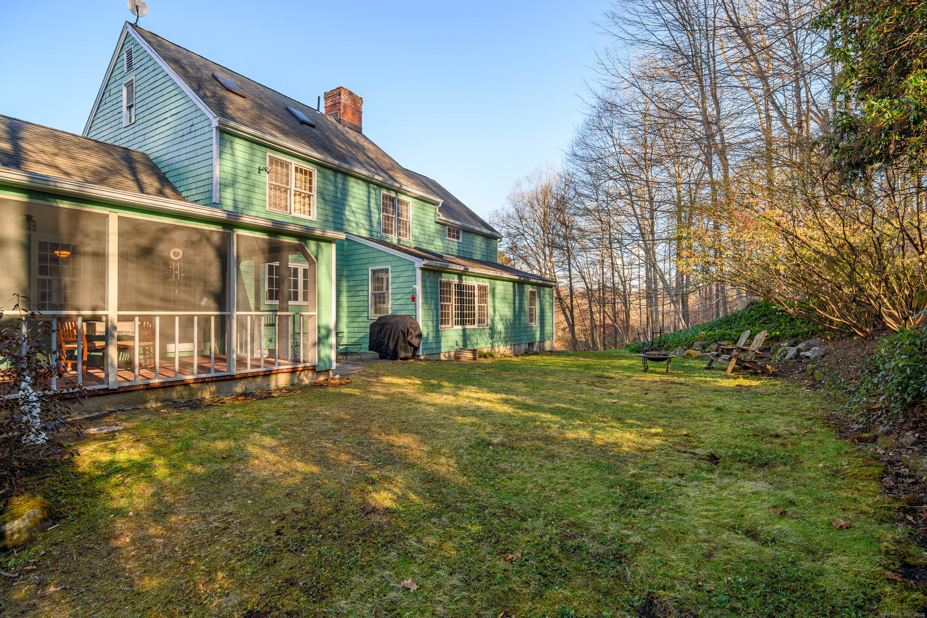14 Concord Ridge Road Newtown, CT 06482 - Photo 33 of 40 a front view of a building with a garden