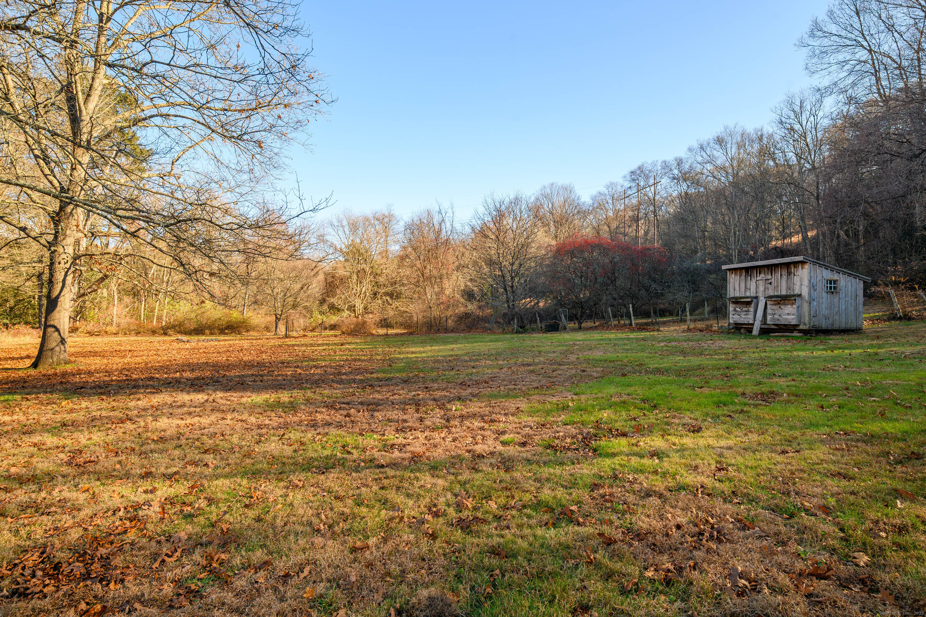 14 Concord Ridge Road Newtown, CT 06482 - Photo 34 of 40 a view of a house with a yard