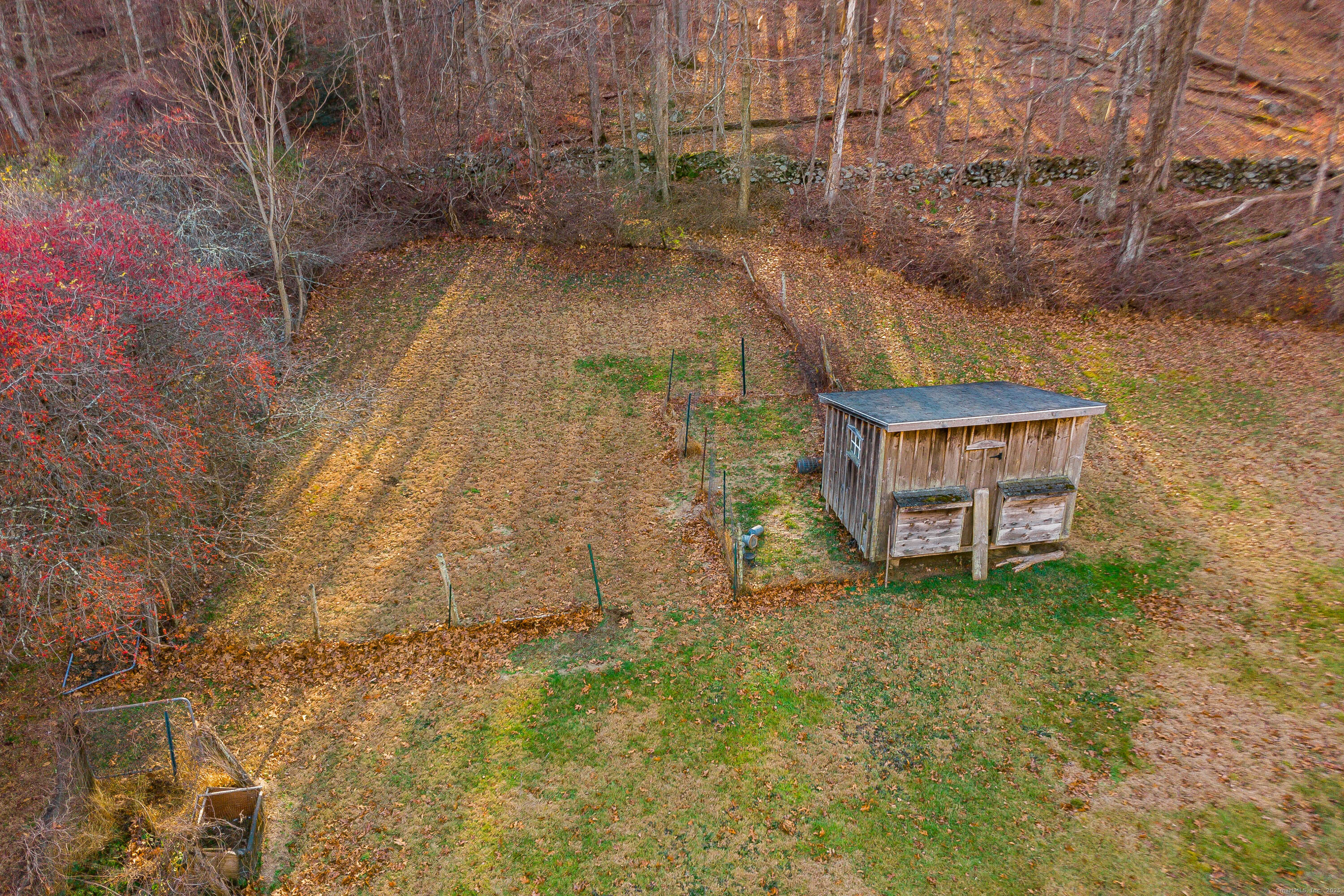 14 Concord Ridge Road Newtown, CT 06482 - Photo 38 of 40 a view of a yard with wooden fence