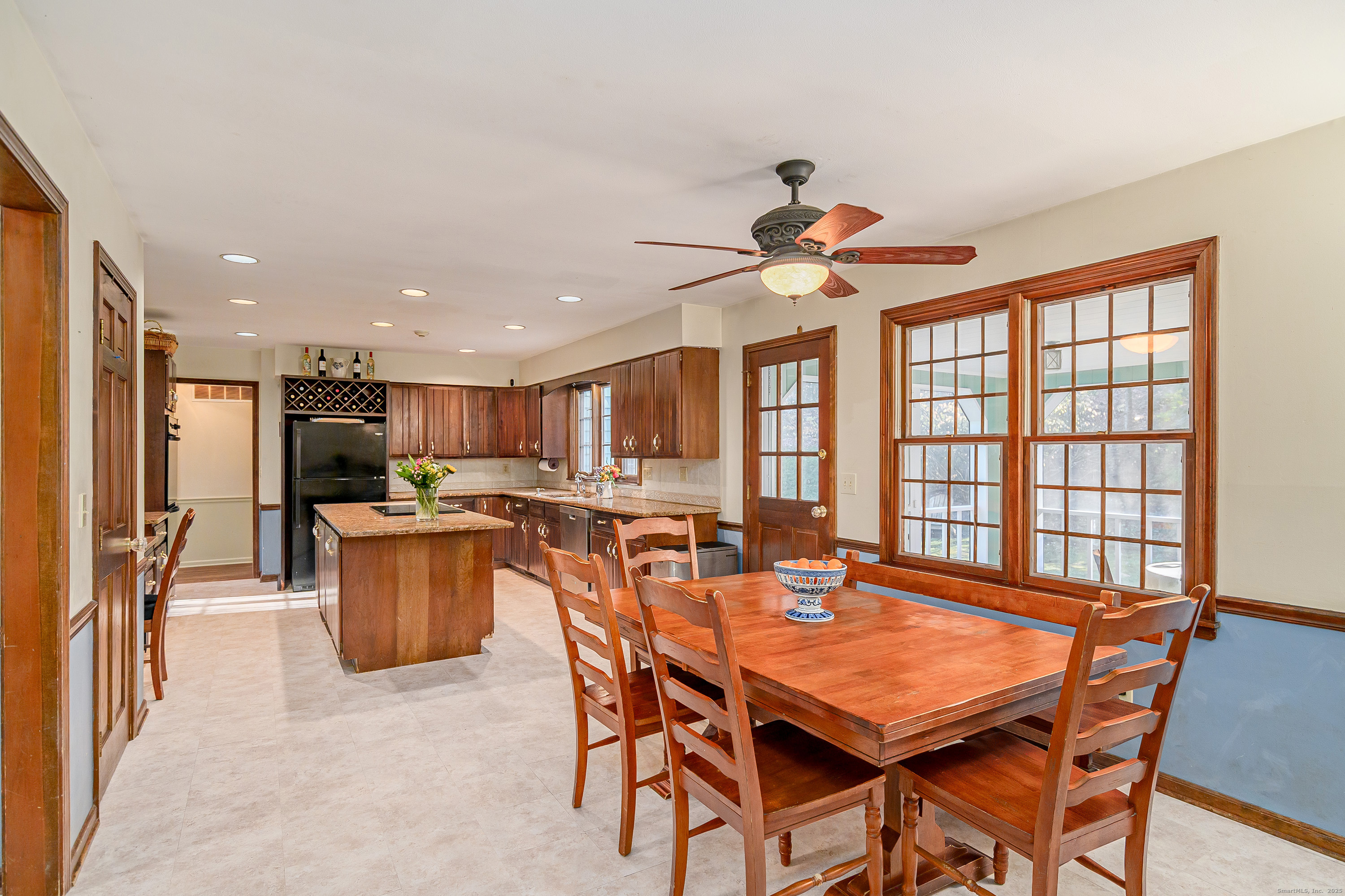 14 Concord Ridge Road Newtown, CT 06482 - Photo 8 of 40 a dining room with furniture a window and a chandelier