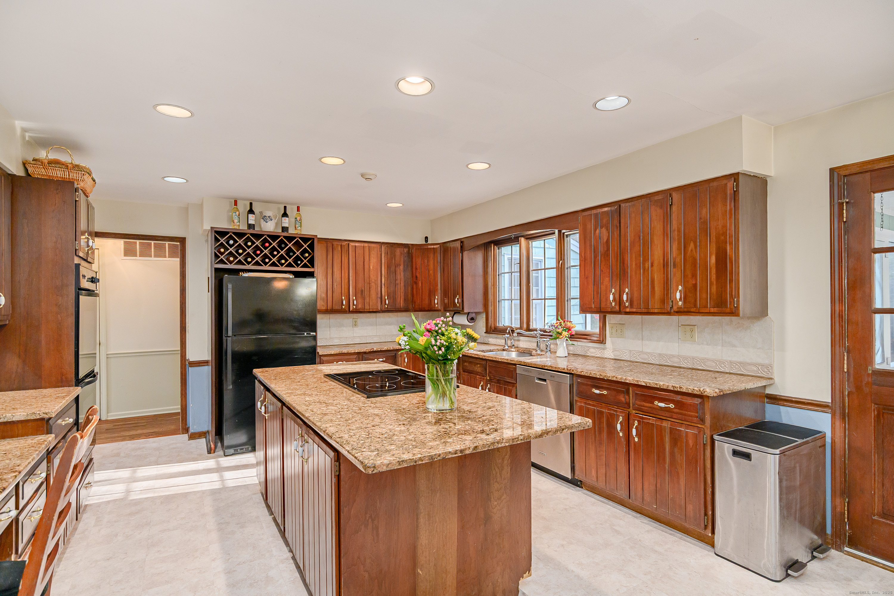 14 Concord Ridge Road Newtown, CT 06482 - Photo 9 of 40 a kitchen with stainless steel appliances granite countertop a sink stove and refrigerator