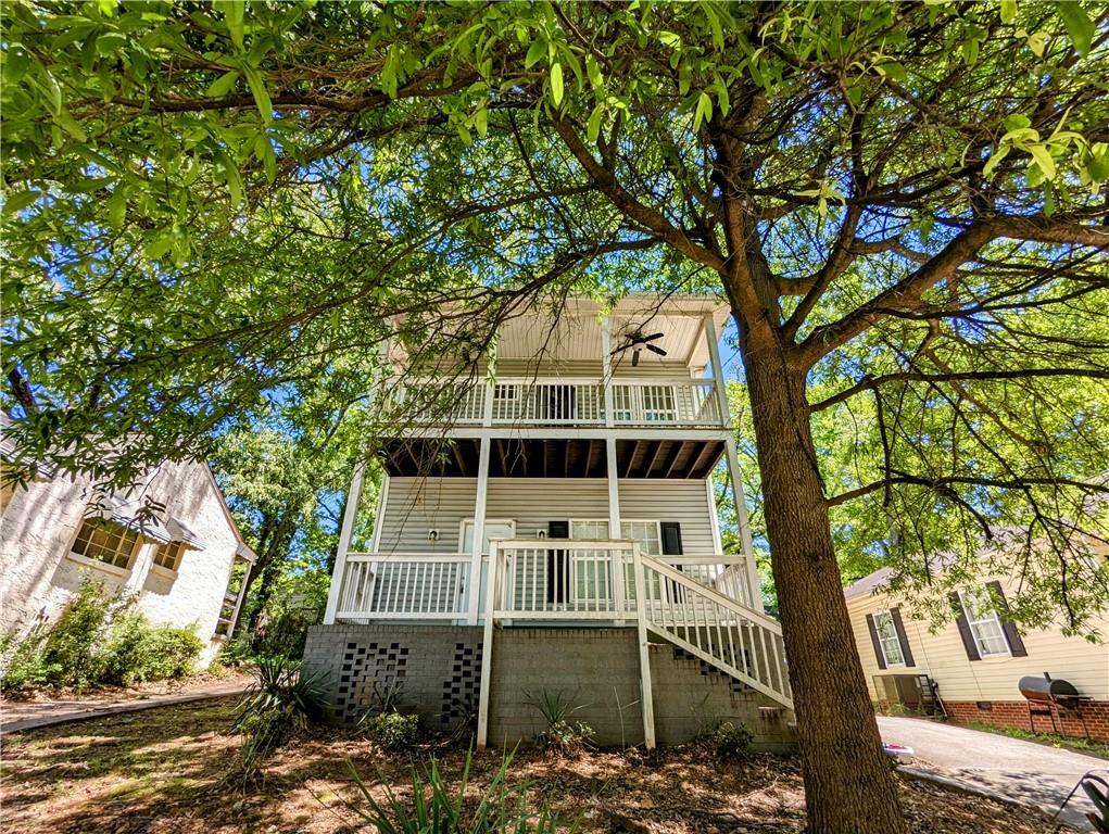 1146 Ira Street Southwest Atlanta, GA 30310 - Photo 1 of 1 a front view of a house with a tree
