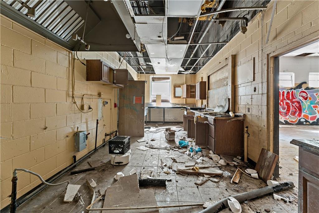 101 Hazlett Street Pittsburgh, PA 15214 - Photo 13 of 37 a room with lots of appliances and cabinets