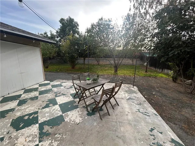 a view of swimming pool with a patio