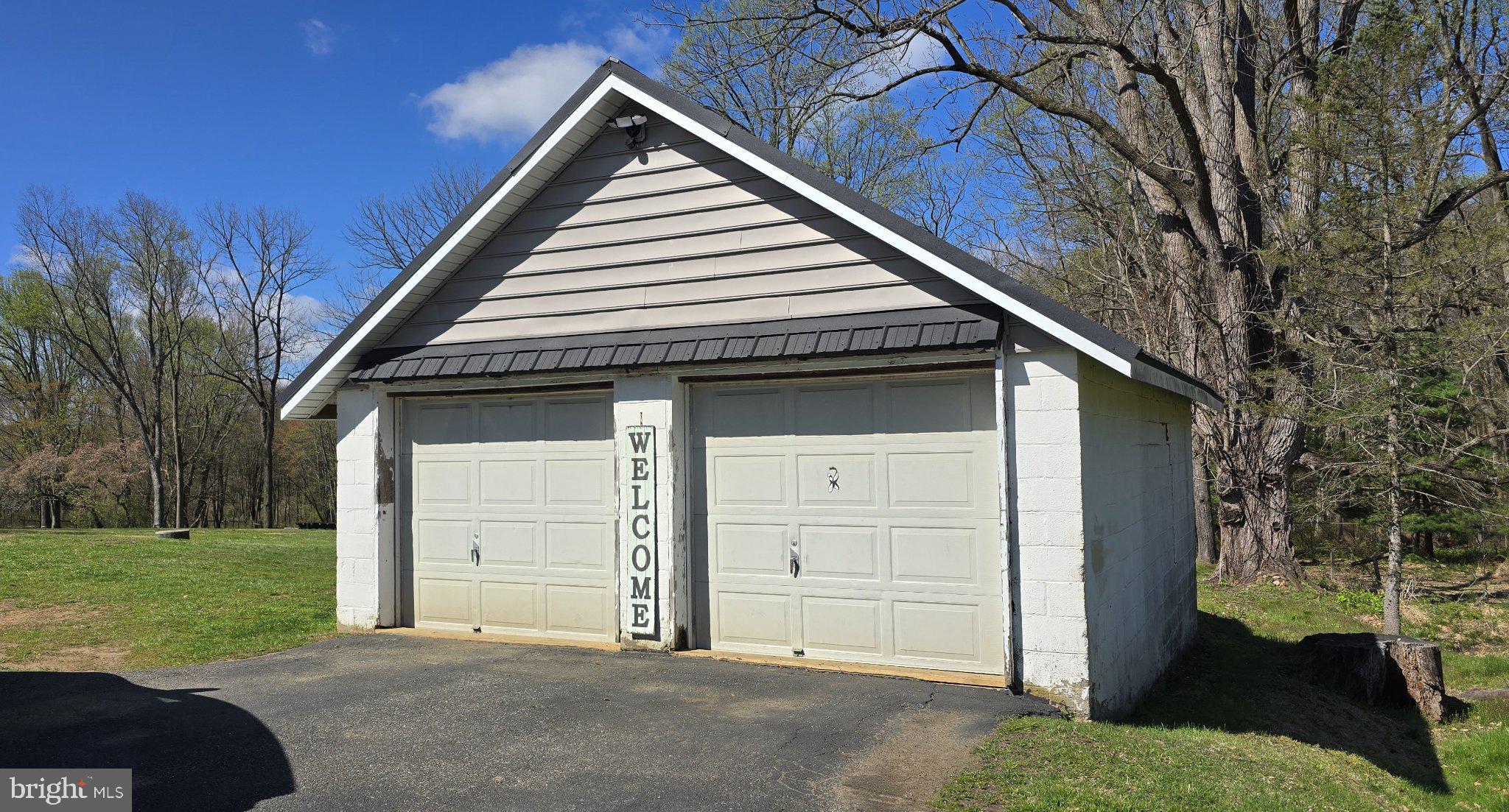 1233 New London Road Landenberg, PA 19350 - Photo 34 of 37 Charming garage with a warm welcome.