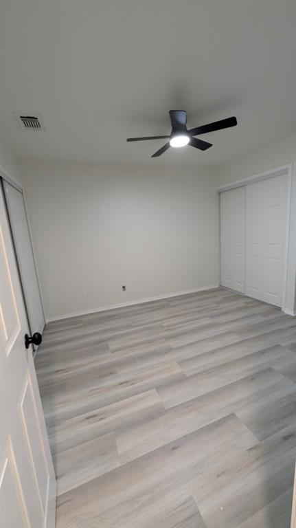 2240 Tarpley Road, Unit 92 Carrollton, TX 75006 - Photo 11 of 17 wooden floor in an empty room
