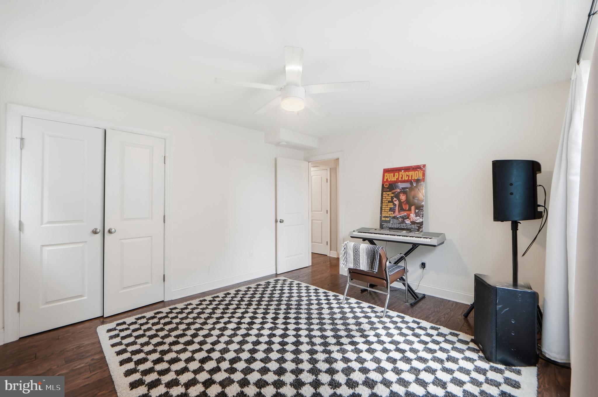 1258 Holbrook Terrace Northeast, Unit 5 Washington, DC 20002 - Photo 23 of 25 a bedroom with a bed and a table