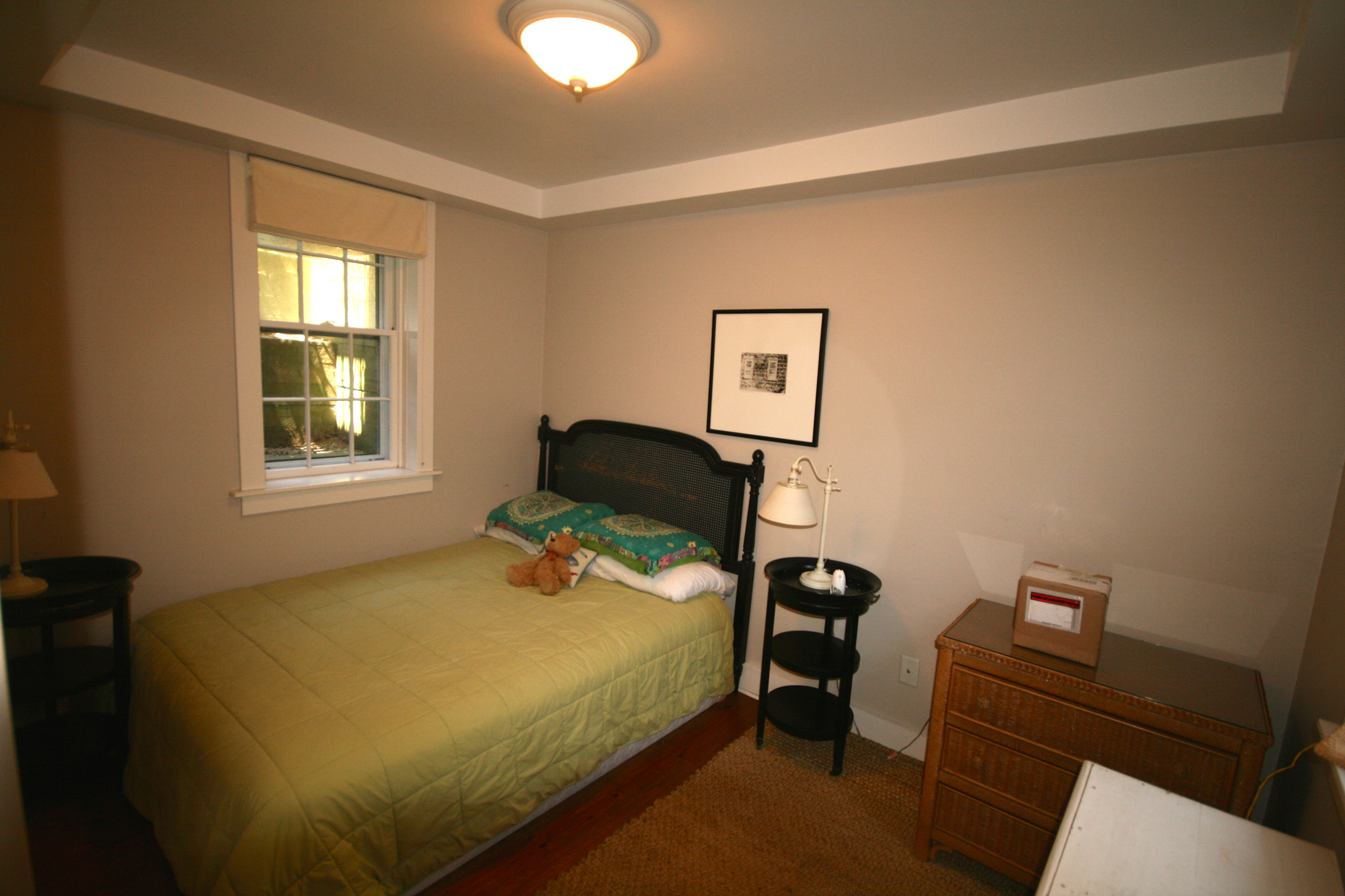 29 South A S Shore Road, Unit A Nantucket, MA 02554 - Photo 16 of 19 a bedroom with a bed and wooden floor