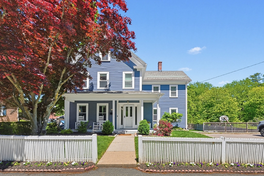 345 Sherman Street Canton, MA 02021 - Photo 40 of 42 a front view of a house with a garden