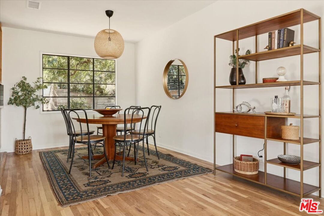 2467 Silver Ridge Avenue Los Angeles, CA 90039 - Photo 11 of 42 a view of a dining room and livingroom