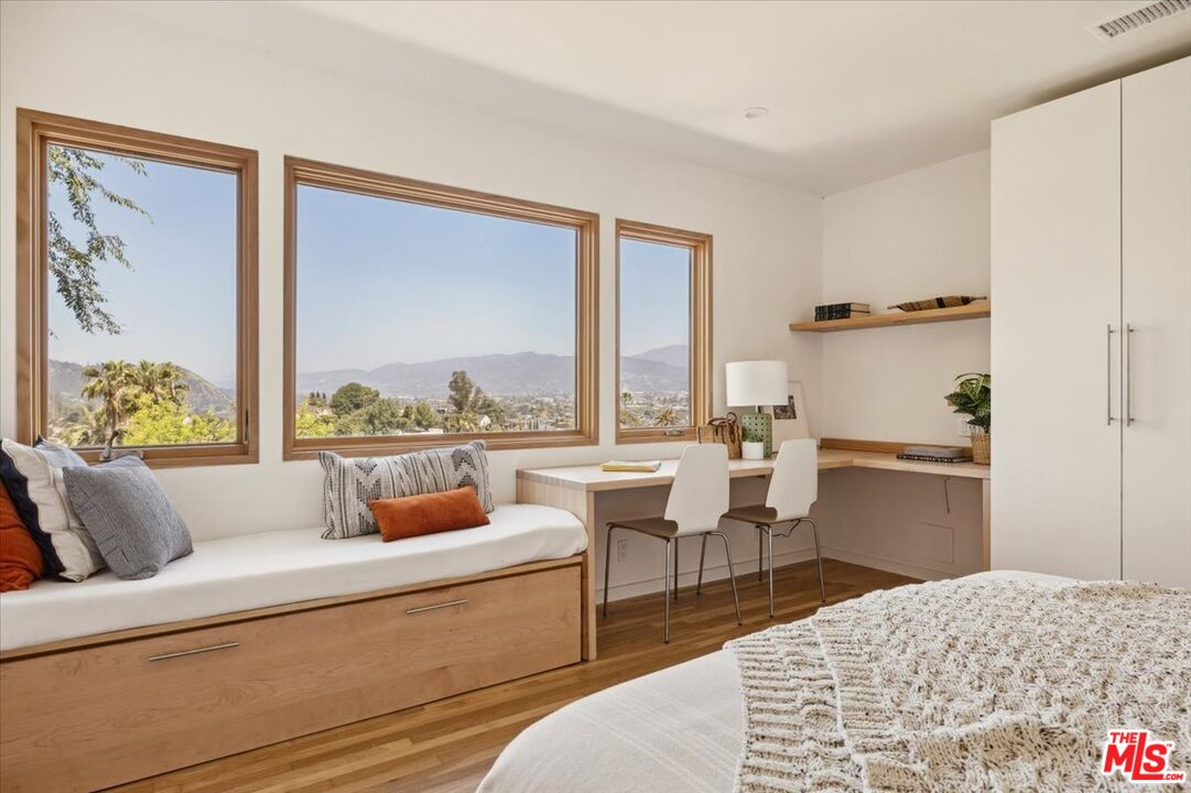 2467 Silver Ridge Avenue Los Angeles, CA 90039 - Photo 18 of 42 a living room with furniture and a window