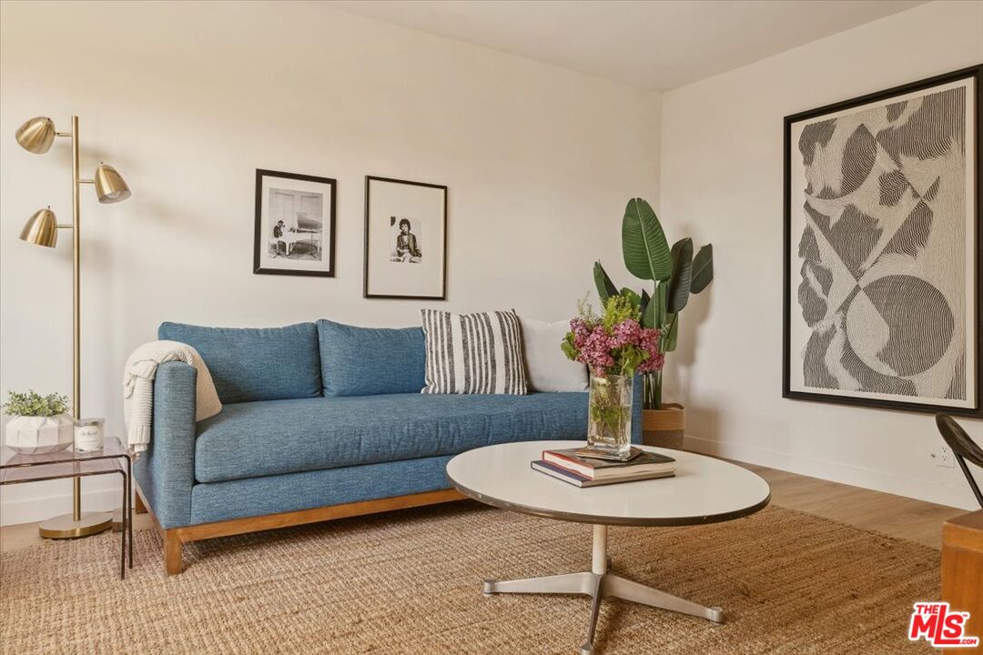2467 Silver Ridge Avenue Los Angeles, CA 90039 - Photo 21 of 42 a living room with furniture and a table