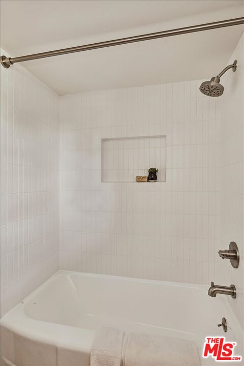 2467 Silver Ridge Avenue Los Angeles, CA 90039 - Photo 28 of 42 a bathroom with a shower and a bath tub
