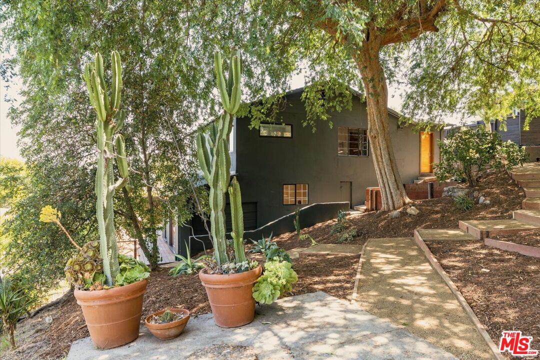2467 Silver Ridge Avenue Los Angeles, CA 90039 - Photo 38 of 42 a view of a house with backyard and sitting area
