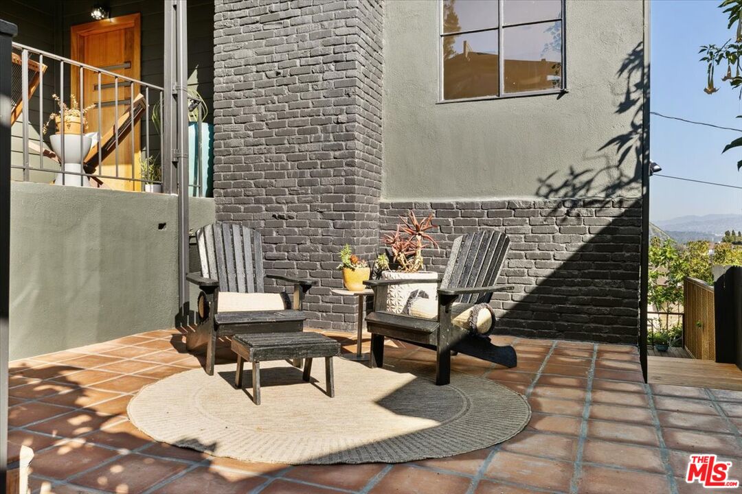 2467 Silver Ridge Avenue Los Angeles, CA 90039 - Photo 5 of 42 a building outdoor space with patio furniture