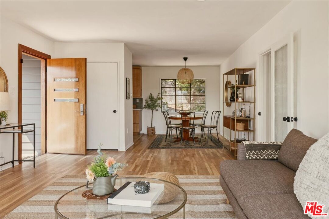 2467 Silver Ridge Avenue Los Angeles, CA 90039 - Photo 7 of 42 a living room with furniture and wooden floor