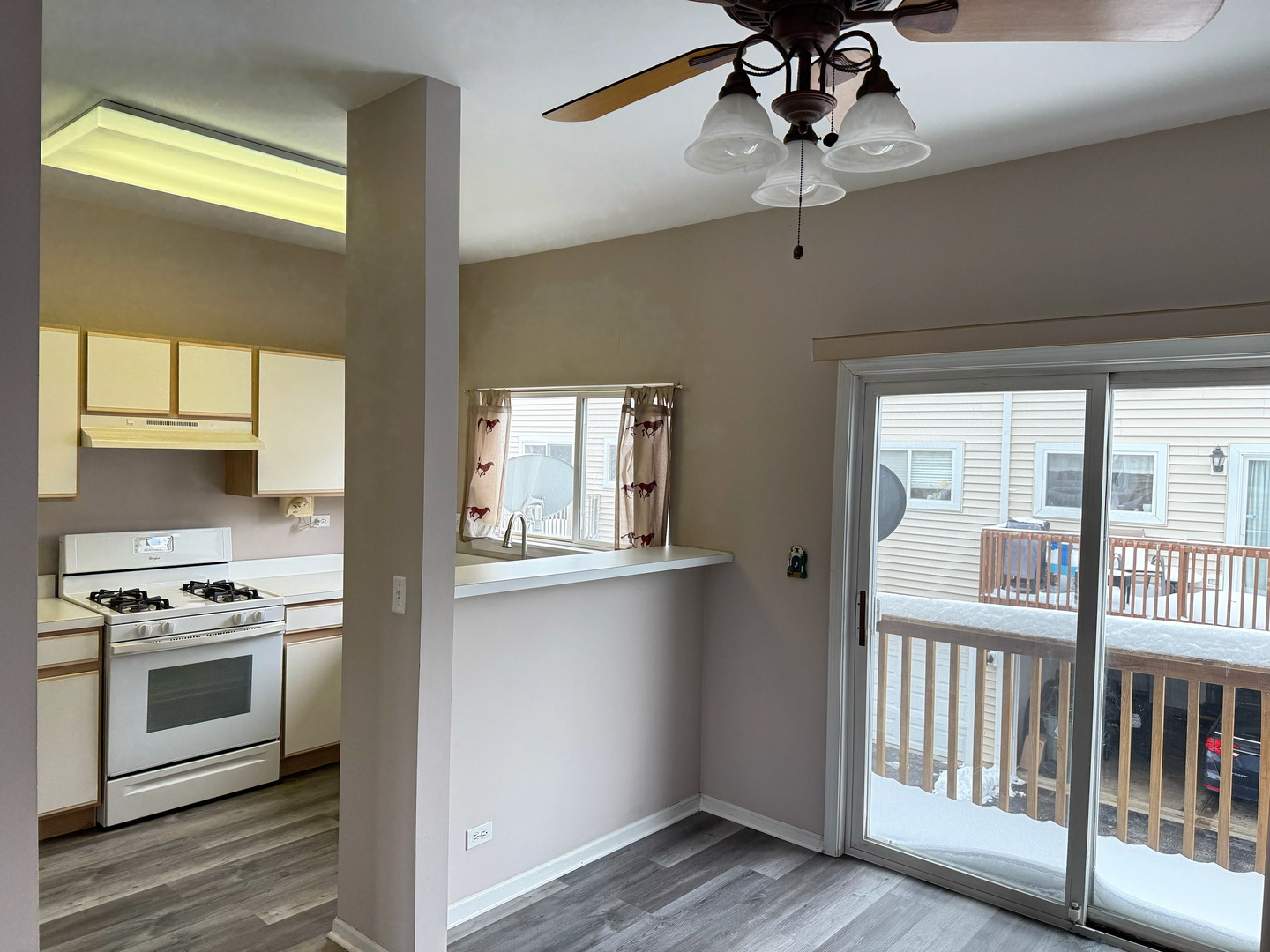 1116 Village Center Parkway Aurora, IL 60506 - Photo 4 of 16 a kitchen with stove and cabinets