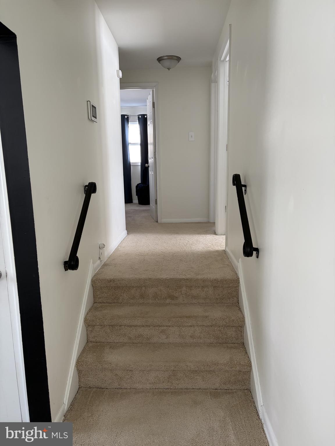 151 West Rutherford Drive Newark, DE 19713 - Photo 6 of 6 a view of staircase with white door