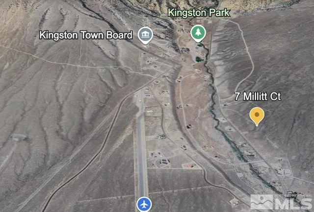 a living room with a wooden floor