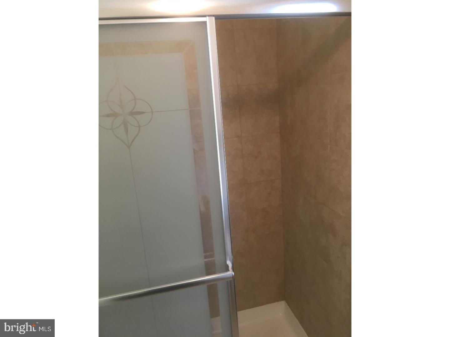 4 Beryl Road Paoli, PA 19301 - Photo 9 of 12 a bathroom with a shower