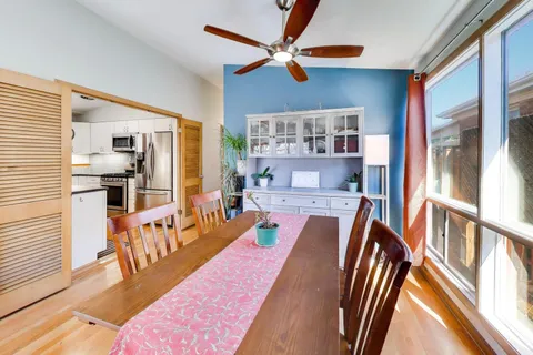 a bathroom with a shower and a glass door