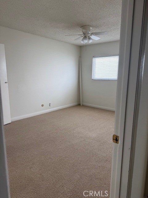 207 West Marquita, Unit 6 San Clemente, CA 92672 - Photo 13 of 15 a view of an empty room and a window