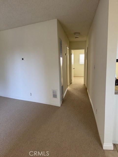 207 West Marquita, Unit 6 San Clemente, CA 92672 - Photo 5 of 15 a view of a hallway
