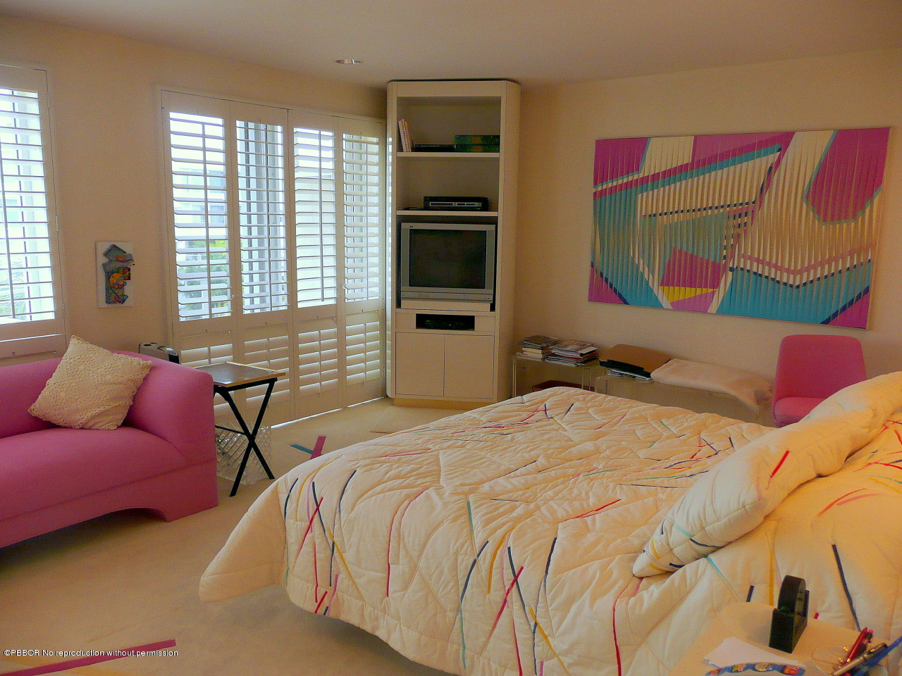 44 Cocoanut Row, Unit 510B 511B Palm Beach, FL 33480 - Photo 12 of 15 a bedroom with a bed and wooden floor