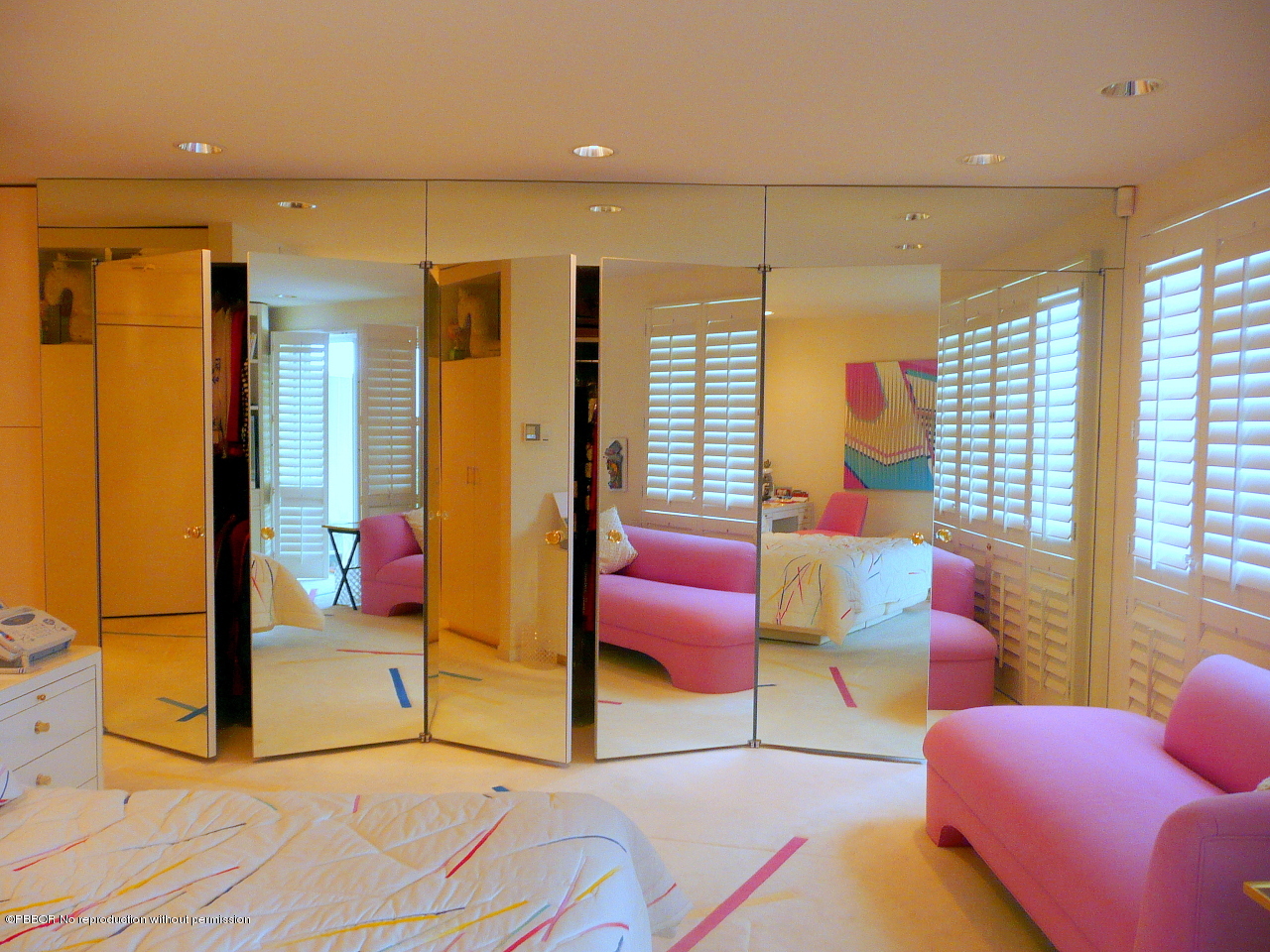 44 Cocoanut Row, Unit 510B 511B Palm Beach, FL 33480 - Photo 13 of 15 a bedroom with furniture and a large window