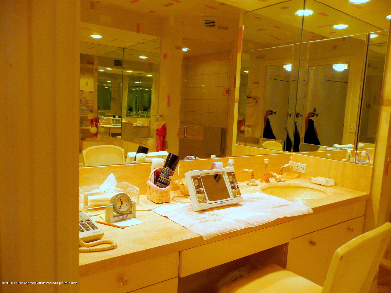 44 Cocoanut Row, Unit 510B 511B Palm Beach, FL 33480 - Photo 14 of 15 a bathroom with a sink and a mirror