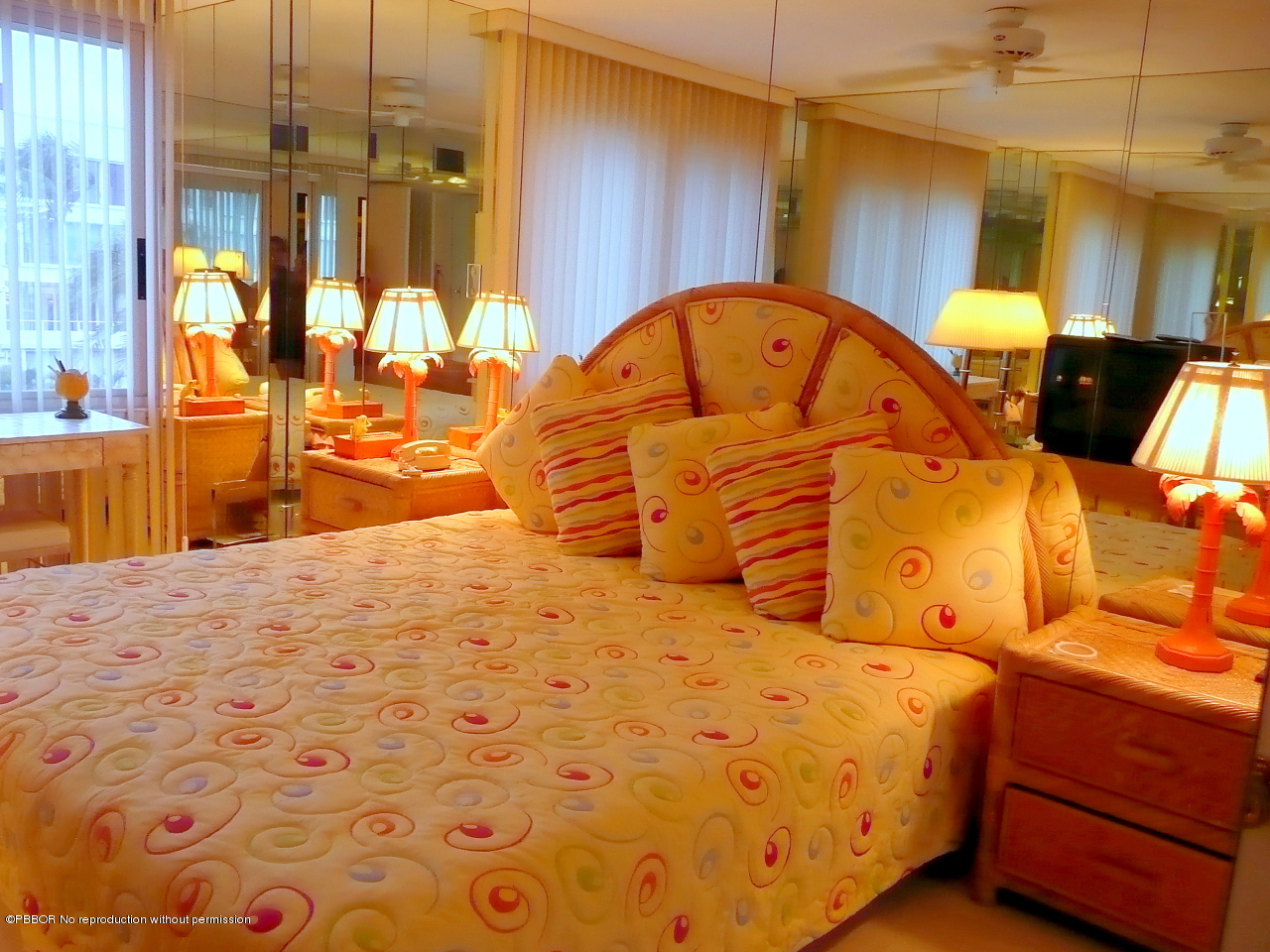 44 Cocoanut Row, Unit 510B 511B Palm Beach, FL 33480 - Photo 10 of 15 a bedroom with a bed and wooden floor