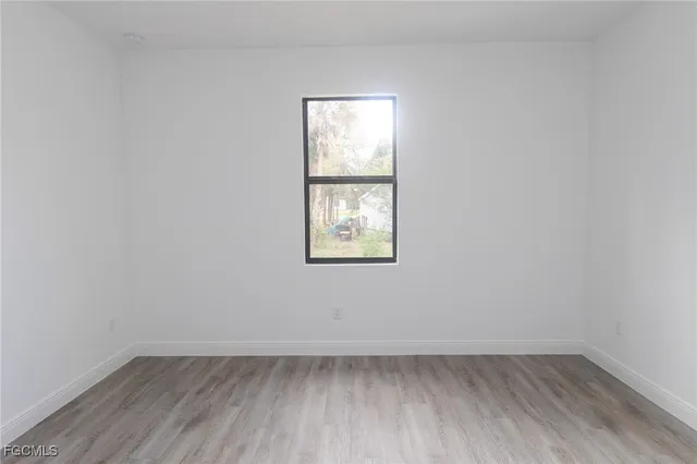 an empty room with a window