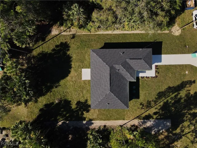 an aerial view of residential house with outdoor space