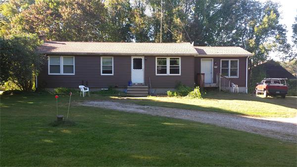 20 B Cheney Road Pomfret, CT 06259 - Photo 1 of 7 a front view of a house with a yard