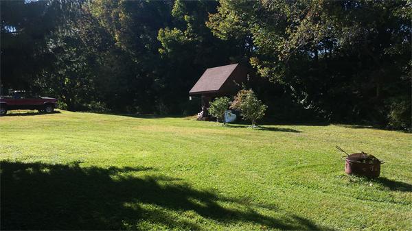 20 B Cheney Road Pomfret, CT 06259 - Photo 6 of 7 a view of an outdoor space and swimming pool