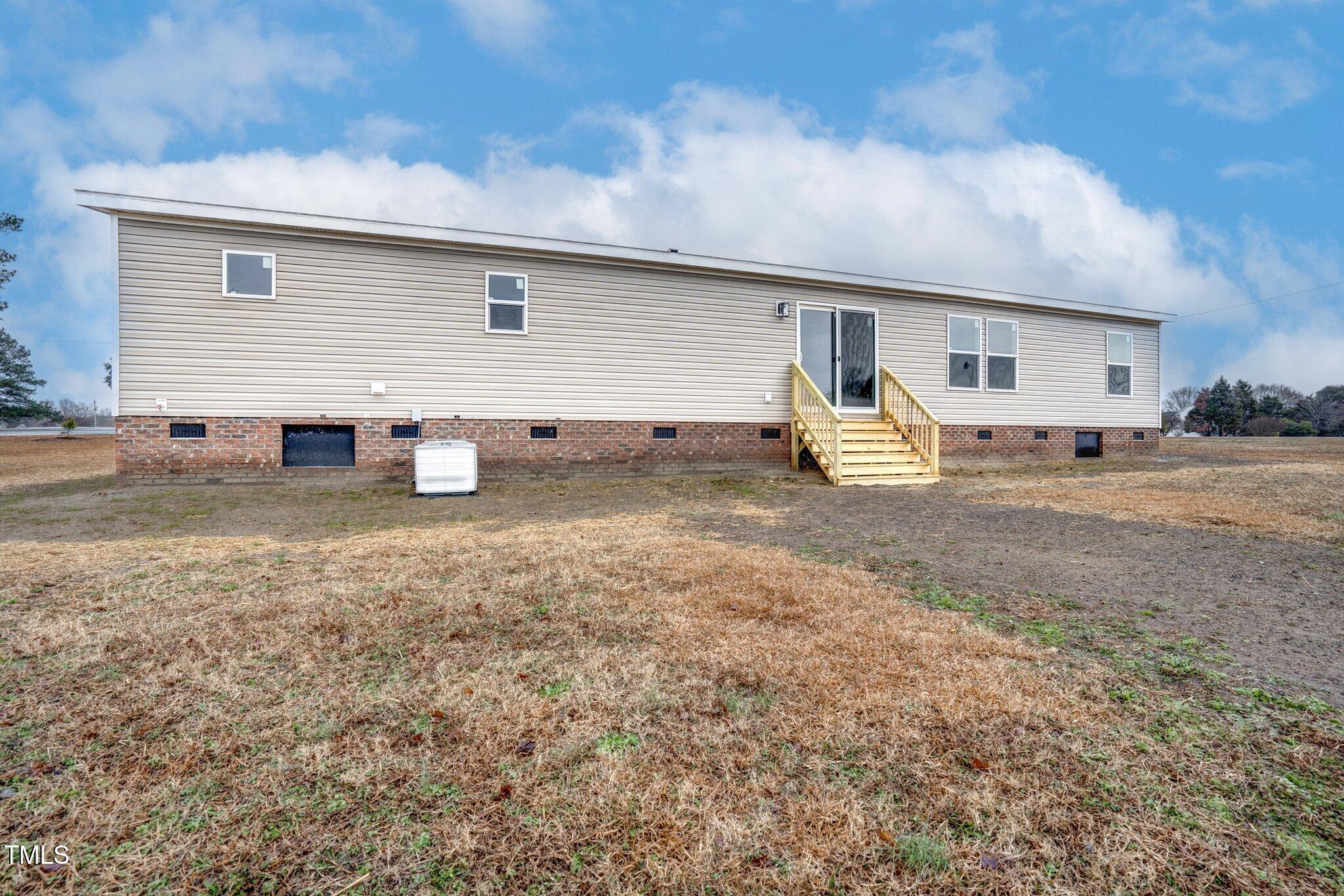 2000 Exum Road Nashville, NC 27856 - Photo 28 of 30 Exterior Back & Offers Sliding French Do