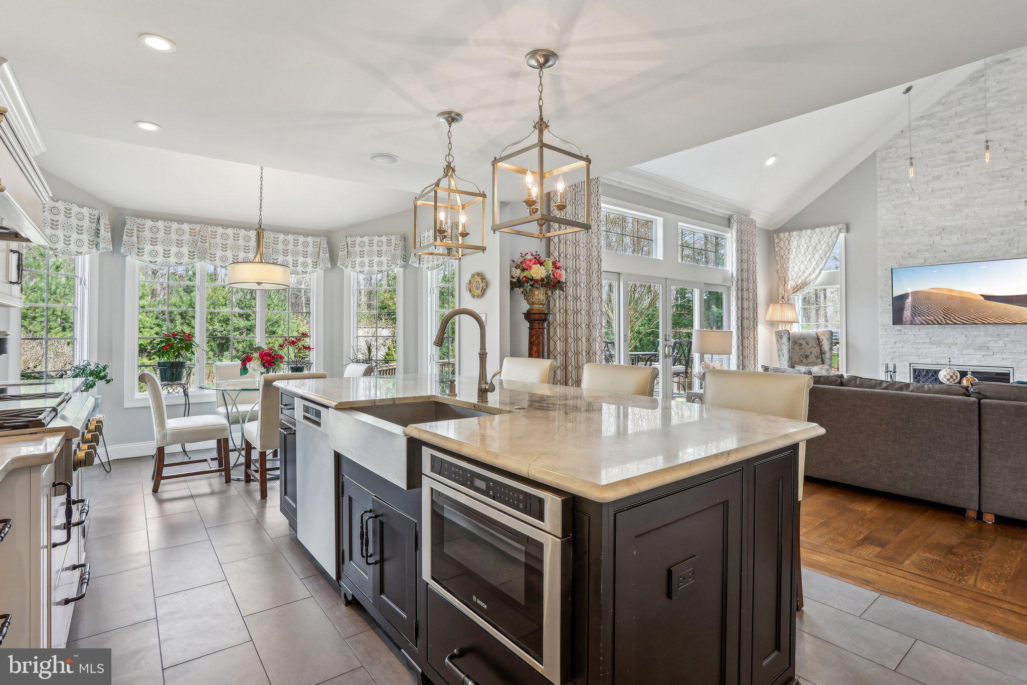 6 Stowe Drive Shamong, NJ 08088 - Photo 17 of 76 a kitchen with a sink stove and cabinets