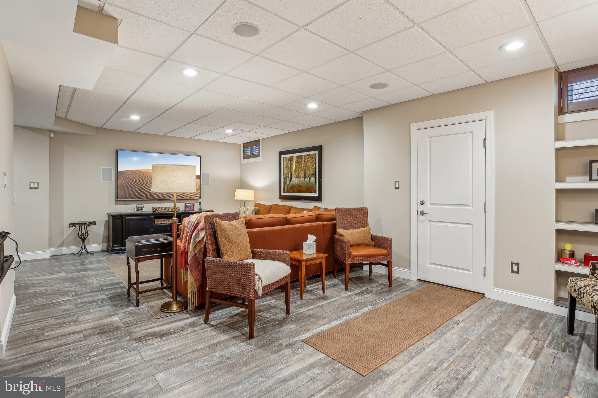 6 Stowe Drive Shamong, NJ 08088 - Photo 48 of 76 a living room with furniture and a flat screen tv