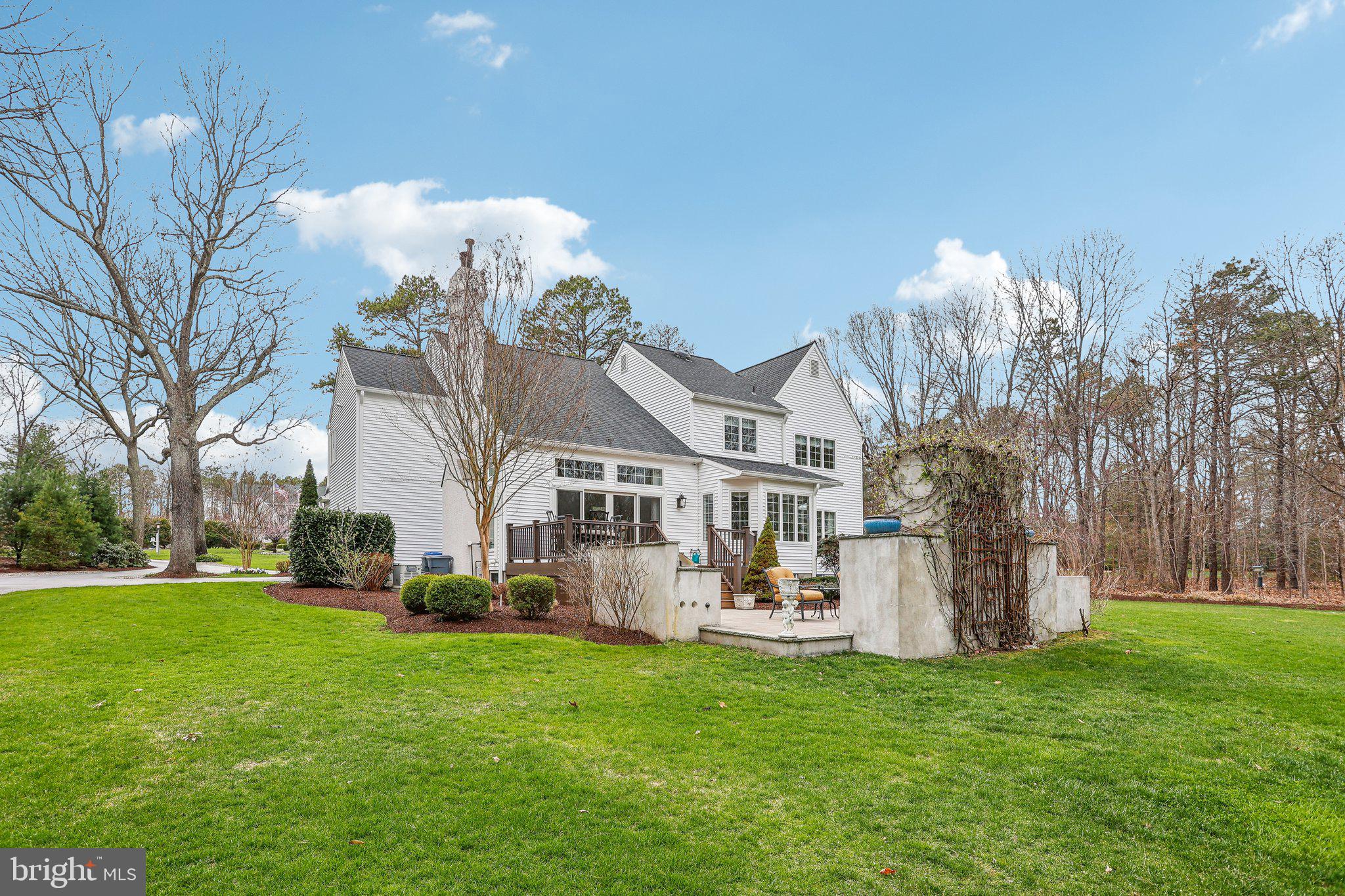 6 Stowe Drive Shamong, NJ 08088 - Photo 61 of 76 a front view of a house with garden and a tree