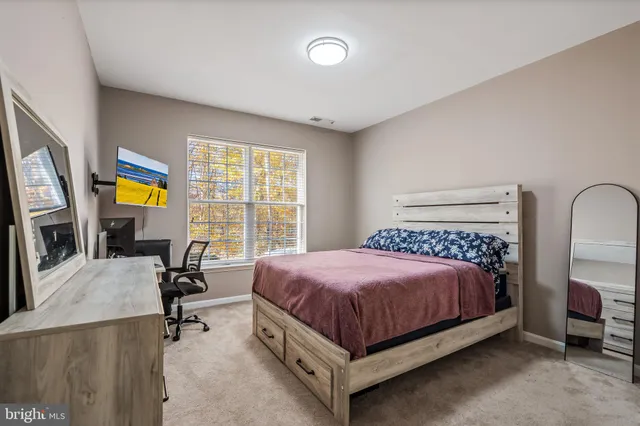 a bathroom with a bath tub and shower