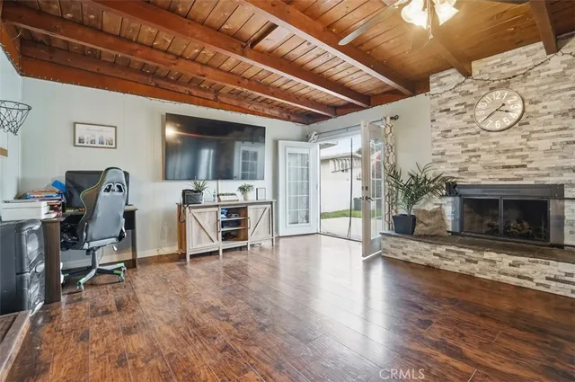 a view of a livingroom with furniture and a fireplace