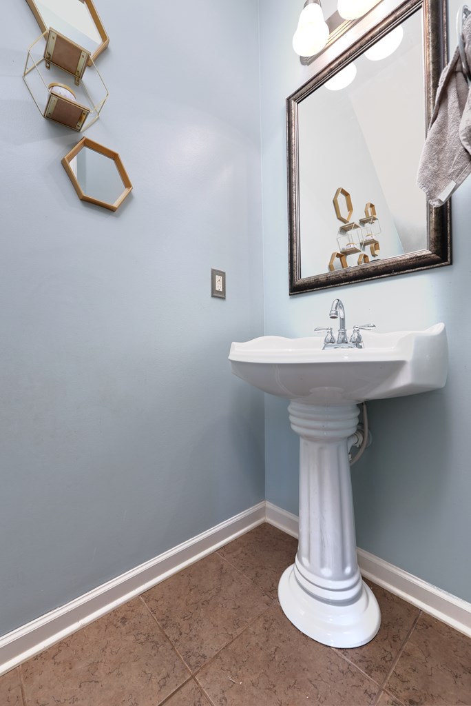 98 Valley Bluff Drive Hamilton, GA 31811 - Photo 13 of 35 a bathroom with a sink and mirror