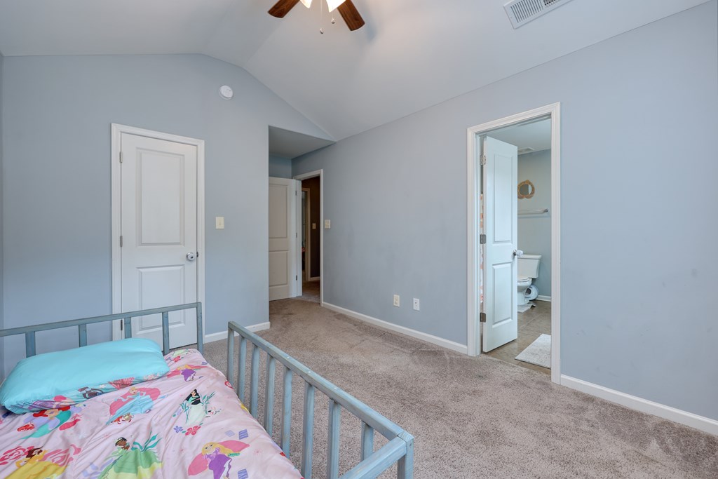 98 Valley Bluff Drive Hamilton, GA 31811 - Photo 23 of 35 a bedroom with bed and hardwood