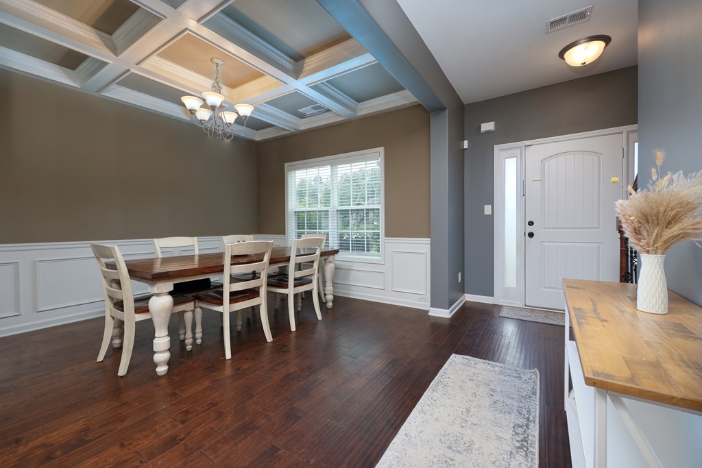 98 Valley Bluff Drive Hamilton, GA 31811 - Photo 3 of 35 a view of a dining room with furniture and wooden floor