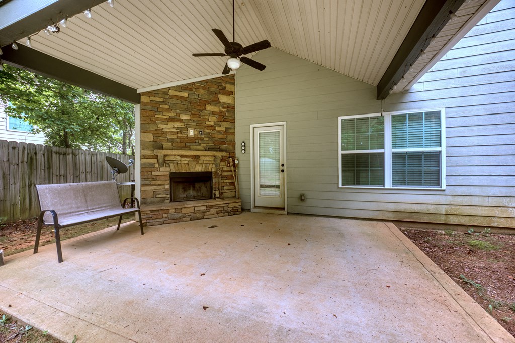 98 Valley Bluff Drive Hamilton, GA 31811 - Photo 31 of 35 a view of a porch with a table and chairs