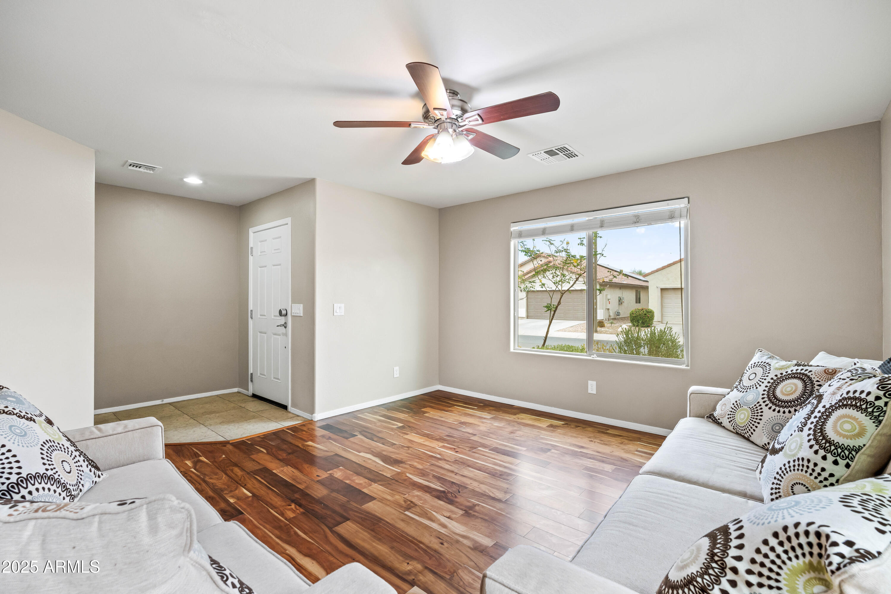 6525 West Georgetown Way Florence, AZ 85132 - Photo 12 of 82 a bedroom with a bed and a window