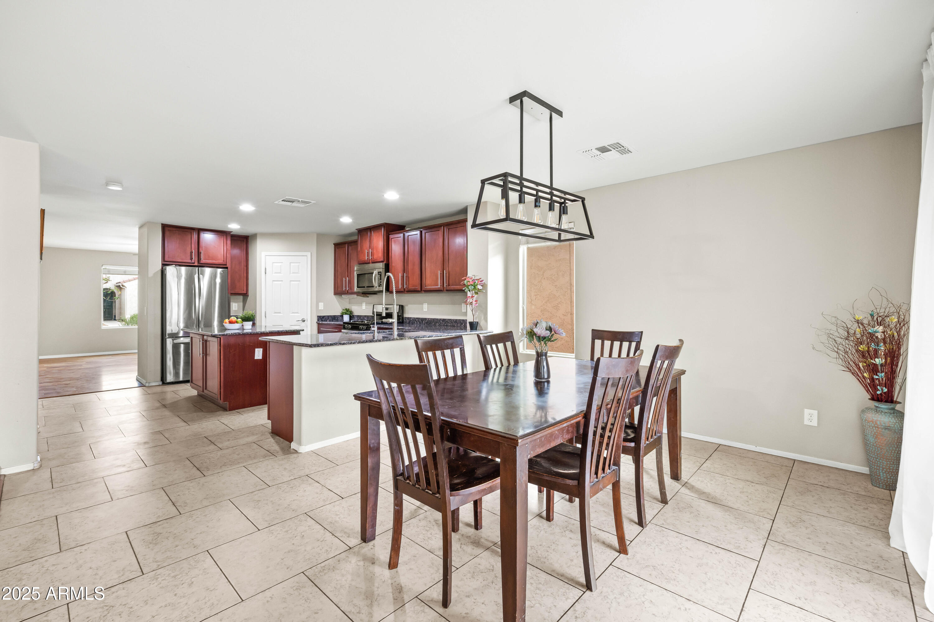 6525 West Georgetown Way Florence, AZ 85132 - Photo 21 of 82 a view of a dining room with furniture