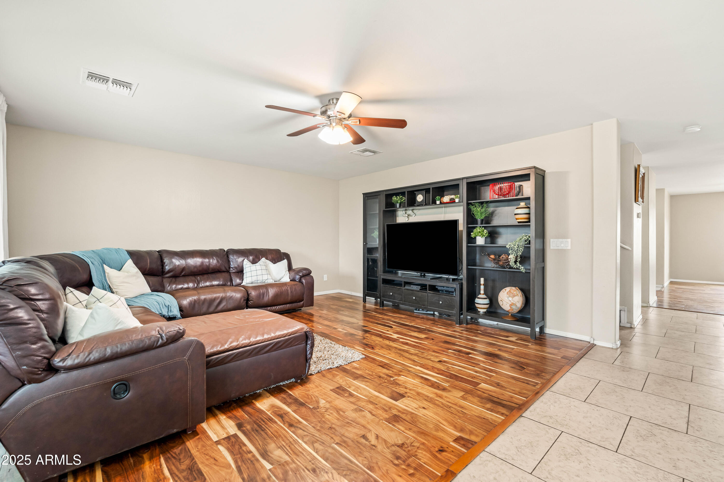 6525 West Georgetown Way Florence, AZ 85132 - Photo 23 of 82 a living room with furniture and a flat screen tv