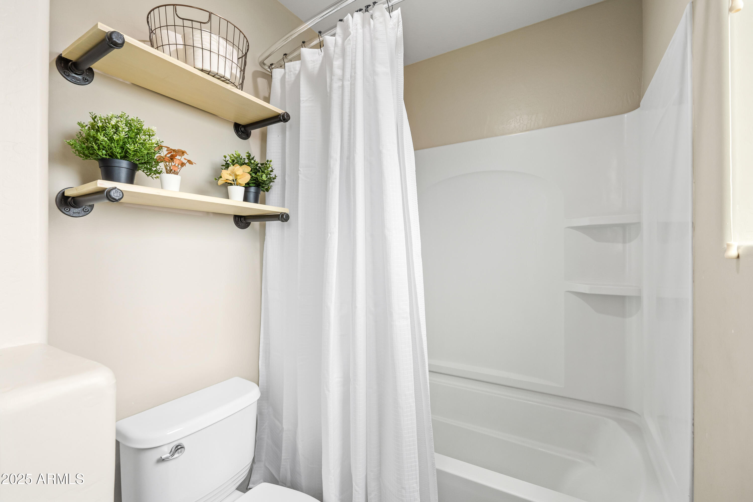 6525 West Georgetown Way Florence, AZ 85132 - Photo 38 of 82 a bathroom with a toilet and a shower